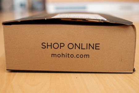 Parcel box from Mohito online shop, April 2021, Prague, Czech Republic.のeditorial素材