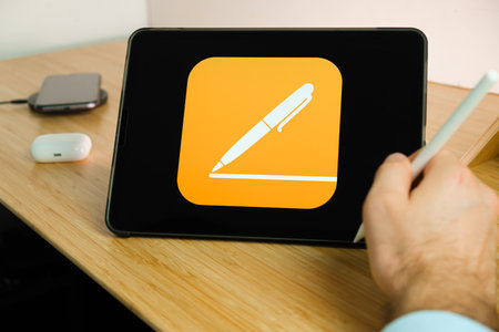 Apple Pages on the screen of iPad tablet. March 2021, San Francisco, USAのeditorial素材