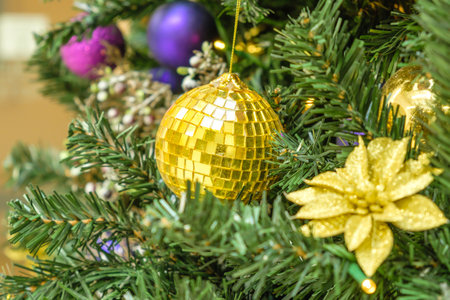 Christmas balls decorate Christmas tree with balls and garland lights with copy space. Preparation...