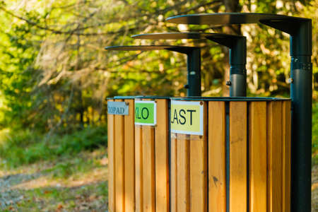 Containers for sorting garbage in the forestの写真素材