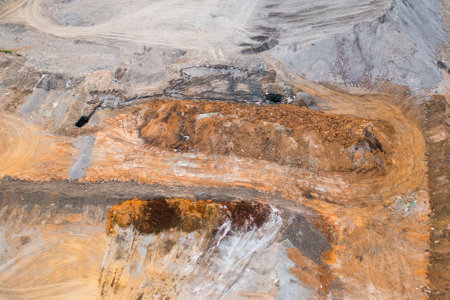 Quarry for mining of natural resources on the hill, aerial viewの写真素材