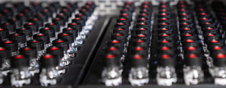 HPLC glass vials with black caps in the auto sampler are waiting for injection.の写真素材