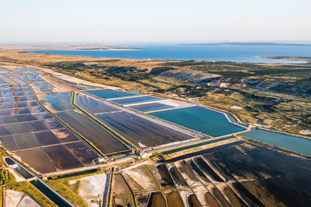 Seawater salt pans on Pag Island are utilized for the production of sea salt, Croatia.の写真素材