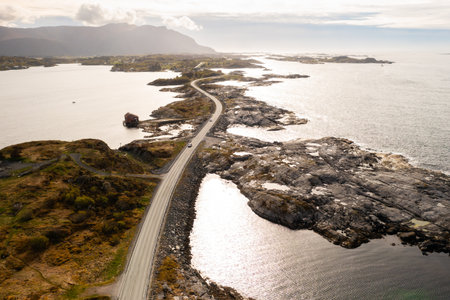 Atlantic ocean road connects intricate network of islands. Scattered islets with sparse vegetation...