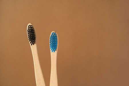 Toothbrushes on isolated brown backgroundの写真素材