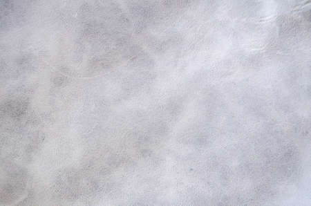 A grey natural leather background top view