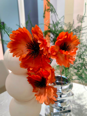 Flowers inside a home ware pot crystal vase contemporary interior blur backgroundの写真素材