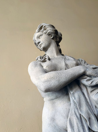 Ancient marble statue of a nude woman. Antique naked female sculpture. Sculpture isolated on white backgroundの写真素材