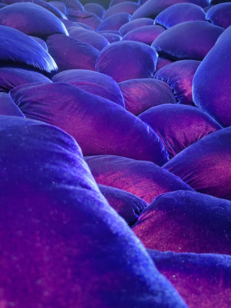 Psychedelic color background made with fluor colored textile. Blue and turquoise colors liquid, bubbles drops.の写真素材