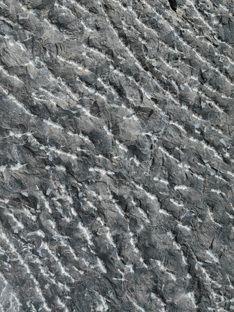 Gray grunge banner. Abstract stone background. The texture of the stone wall. Close-up. Light gray rock backdrop.の写真素材