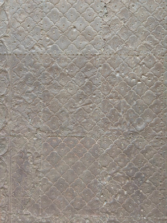 Intricate wood crafted design. Design carved on wooden panel.