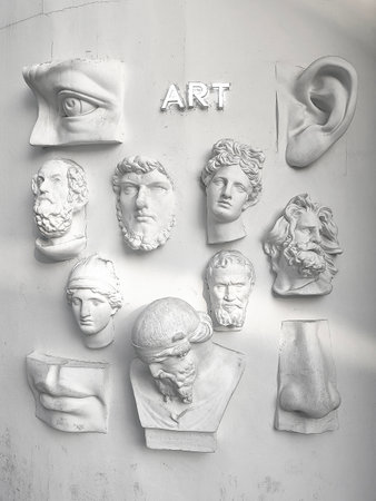 Gypsum copy of ancient statue classical head isolated on black background. Plaster sculpture face.の写真素材