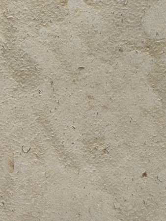 Background of a stone pattern close-up with rich colors and texture for home interior decoration.の写真素材