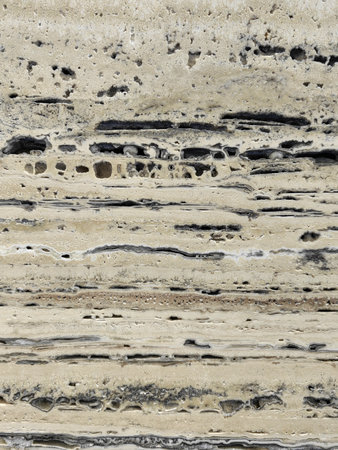 Background of a stone pattern close-up with rich colors and texture for home interior decoration.の写真素材