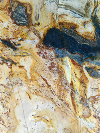 Background of a stone pattern close-up with rich colors and texture for home interior decoration.