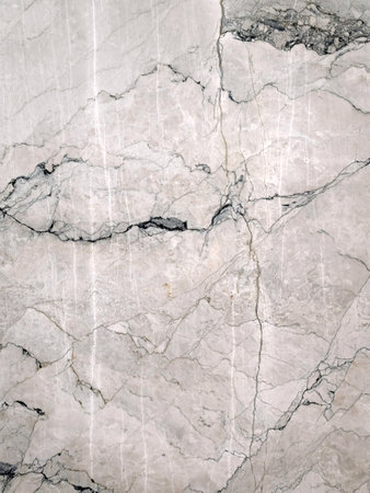 Background of a stone pattern close-up with rich colors and texture for home interior decoration.の写真素材