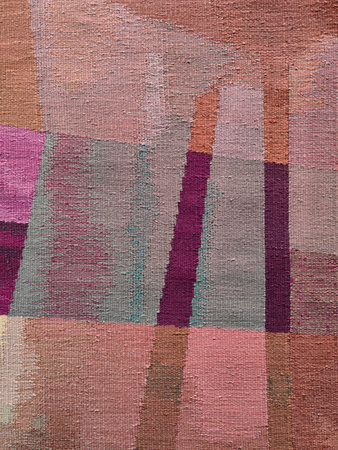 Abstract design featuring colorful overlapping shapes on a textured carpet. The vibrant and modern...