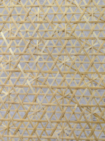 Texture of straw weaving closeup. Straw wicker basket. Fashionable bamboo basket, stylish interior...