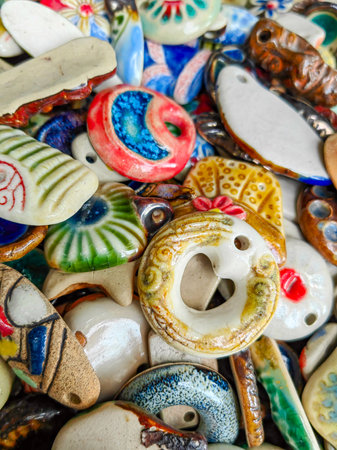 Small porcelain figures to create yourself necklace or bracelets.の写真素材