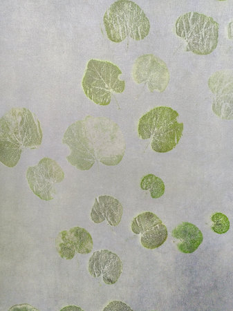Recycled background with flower petals. Pressed floral recycled paper background