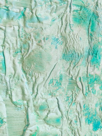 Detail of a beautiful handmade painted silk textile for home interior decoration.