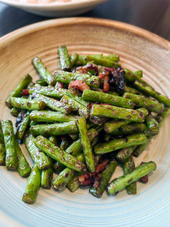 Green Beans & bacon side. Green beans freshly cooked with grated bacon