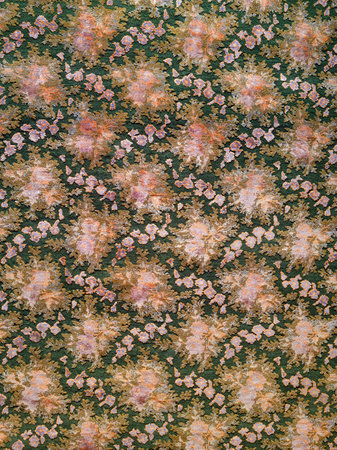 Close-up of a carpet with flowers pattern home interior decoration.