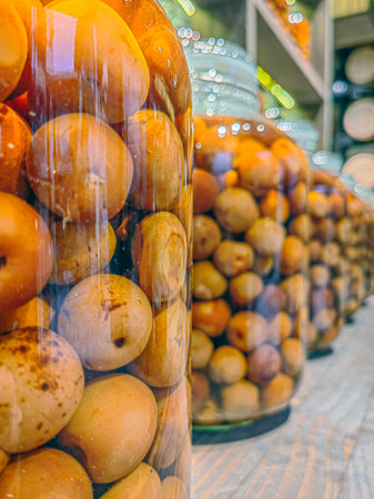 Dried fruits in the clay pots. Traditional Armenian dried apricots figs peaches in the marketplaceの写真素材