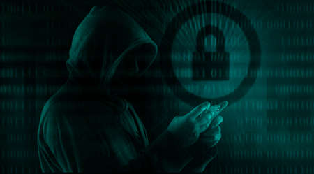 dark web hooded hackerの写真素材