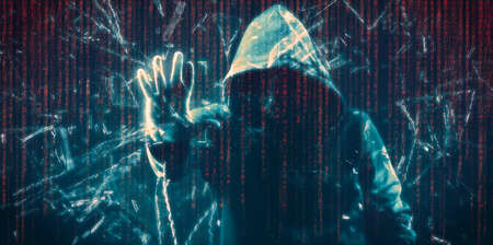 hacker breaking security  barriers concept