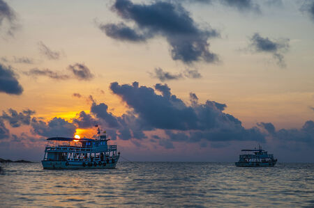 Sunset fisherman long tail boat park at the Rayong beach in Thailandのeditorial素材