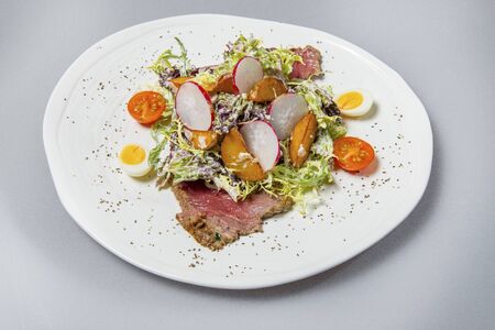Beef Carpaccio With Rocket Salad And Quail Eggsの写真素材