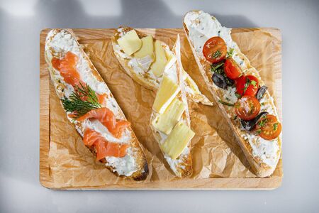 French Baguette Snacks With Salmon Cheese And Vegetablesの写真素材