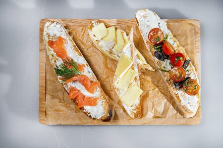 French Baguette Snacks With Salmon Cheese And Vegetablesの写真素材