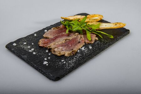 Roast Beef With White Croutons And Arugulaの写真素材