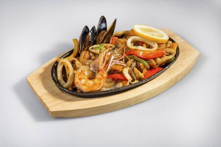 Mixed Fried Seafood On A Cast Iron Panの写真素材