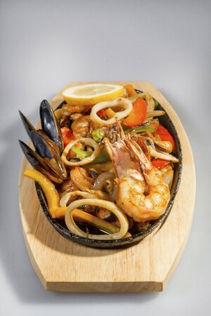 Mixed Fried Seafood On A Cast Iron Panの写真素材