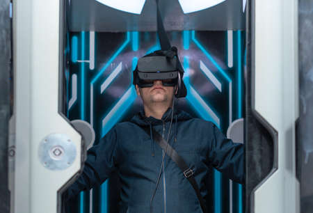 Man using virtual or augmented reality glasses. Concept of modern lifestyle and emerging technologiesの写真素材