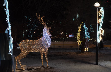 Beautiful illuminated background with Christmas decorations on the streets at night during holidays. Winter holiday background with selective focus. High quality photoの写真素材