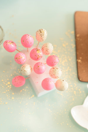 Small bright homemade Easter eggs are ready for decorating Easter cakes by it. Selective focus. Happy Easter concept.の写真素材