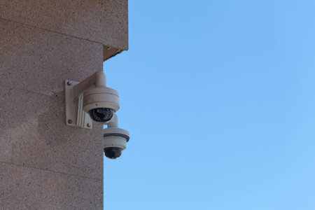 cctv camera security on the wall in cityの写真素材