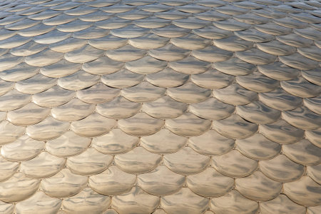 Beautiful dome of mosque, golden shine, against the blue skyの写真素材