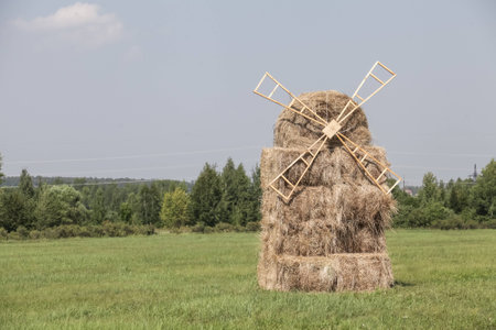 Beautiful summer farm landscapes with haystackの写真素材