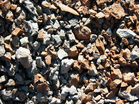The picturesque combination of white and red clay, dry and crackedの写真素材
