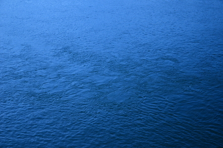 First drops of rain on july Lakeの写真素材