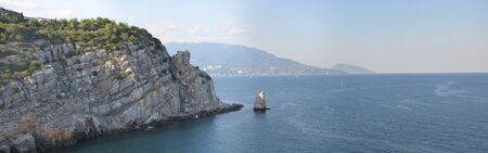 The promenade of Yalta. The port in the black sea. Cloudy weather on the black sea. The City Of Yalta- Crimeaの写真素材