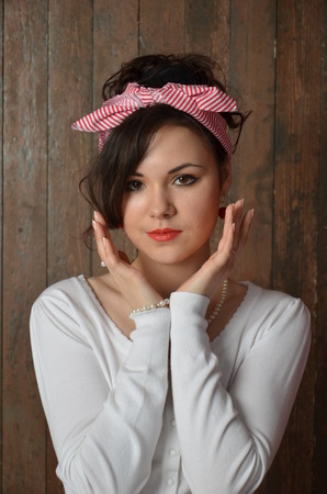Girl in a red skirt and white blouse, vintageの写真素材