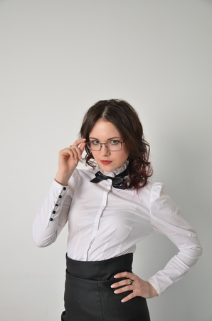 A girl in a strict business suitの写真素材