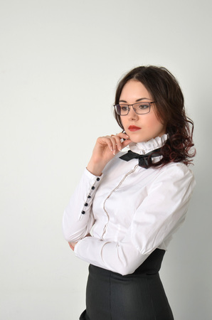 A girl in a strict business suitの写真素材