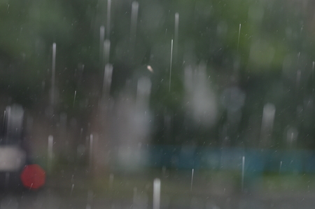Raindrops on black glass on black glassの写真素材